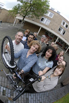 Staff at the Department for Continuing Education with their bike