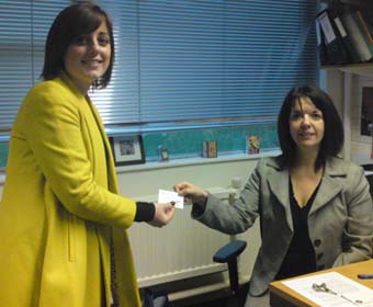 LUYES president Lauren Dalton-Jarvis trades her paperclip with Louise Briggs from LUMS
