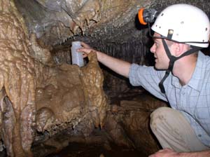 Dr Wynn taking samples from stalagmites.